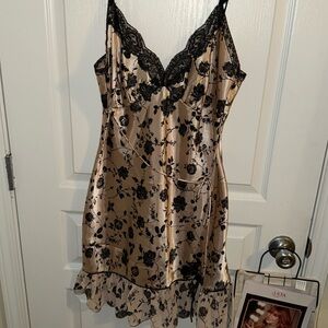Delicates Size M, silk floral pattern with ruffle & spaghetti straps.